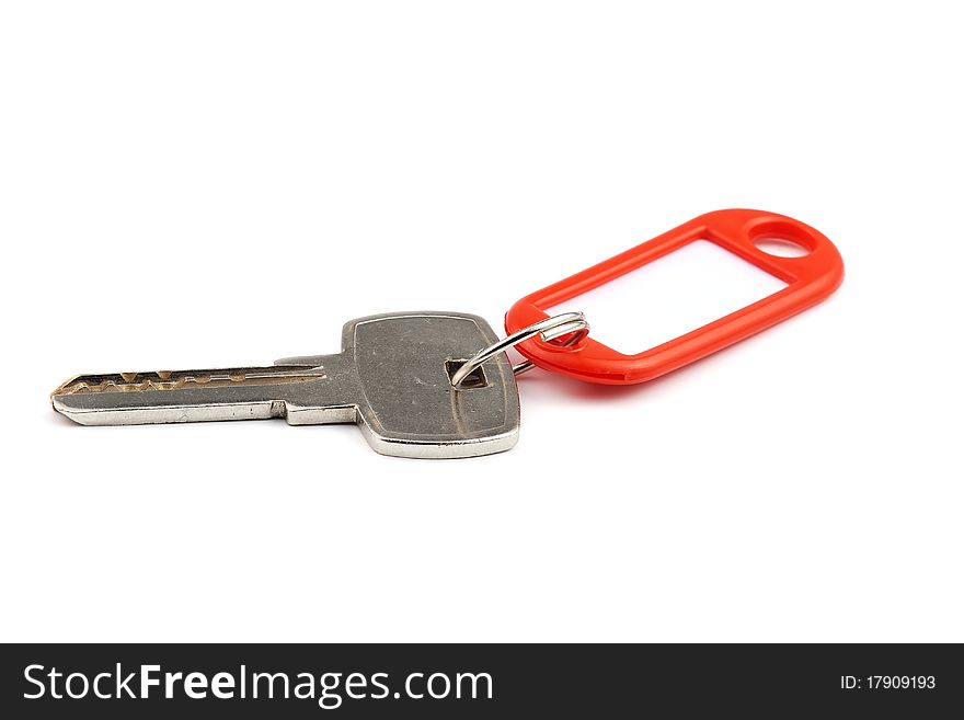 Key with red nameplate isolated over white