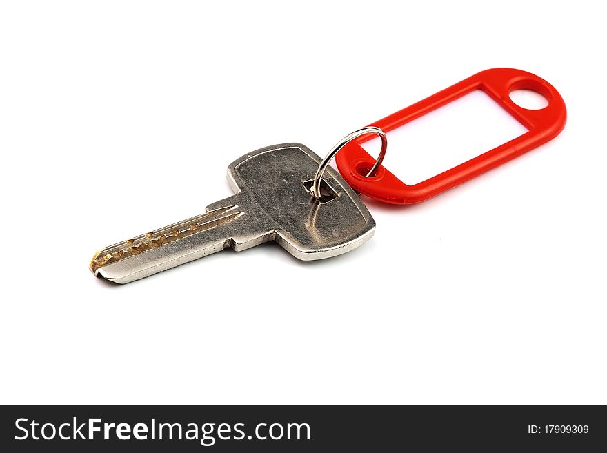 Key with red nameplate isolated over white