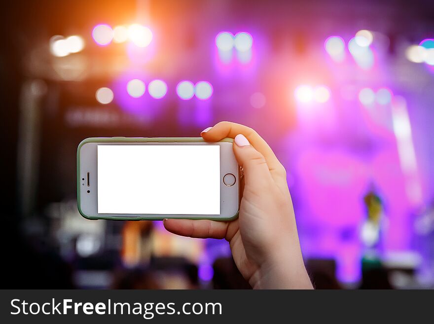 Live Stream For Social Networks At A Concert. Using A Smartphone Camera