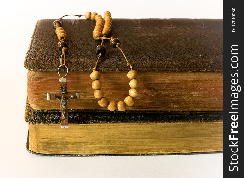 The book of Catholic Church liturgy and rosary beads. The book of Catholic Church liturgy and rosary beads