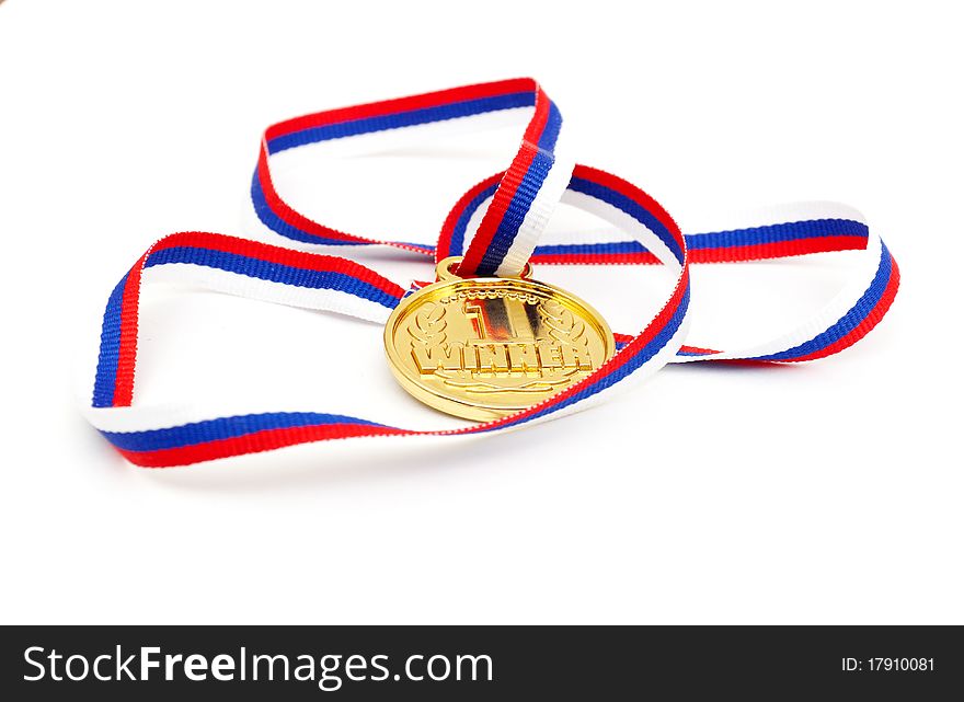 Golden medal and ribbon isolated on white background