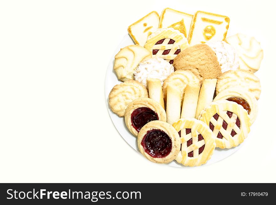 Cookies on a plate with jam on a white background