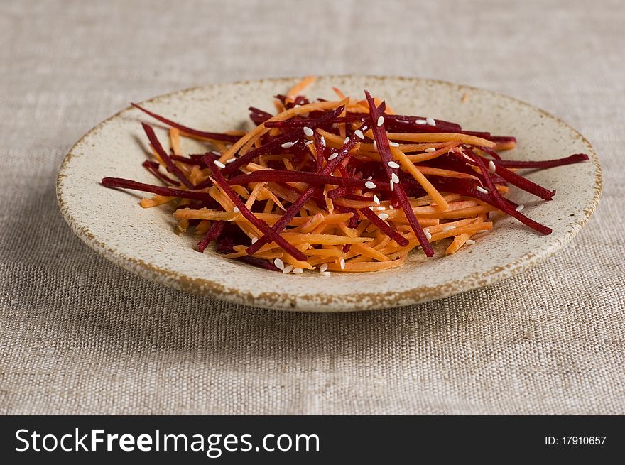 Grated beetroot and carrot with sesame. Grated beetroot and carrot with sesame
