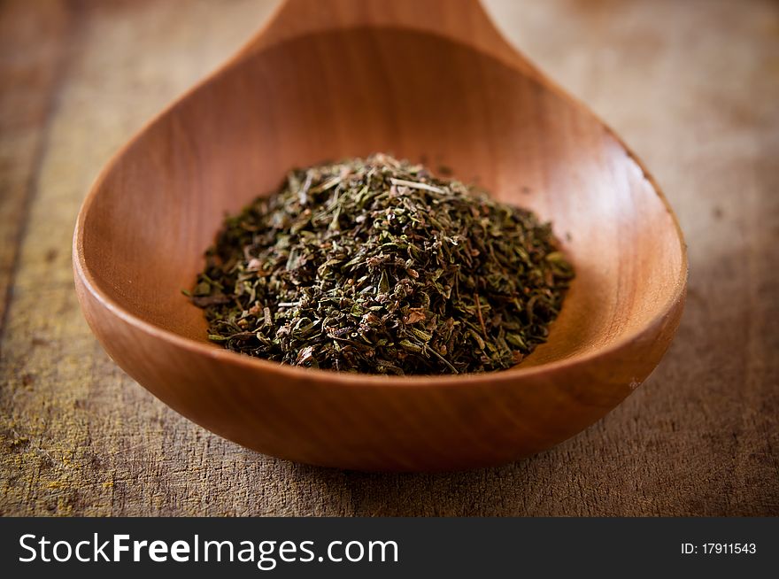 Herbs on wooden spoon