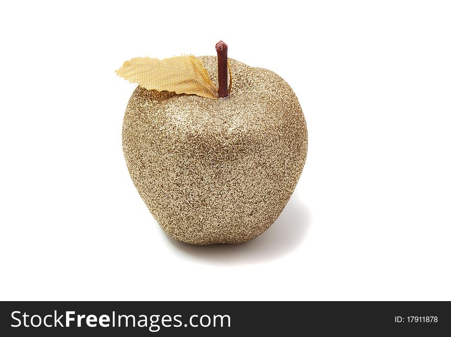 Golden apple shining on a white background