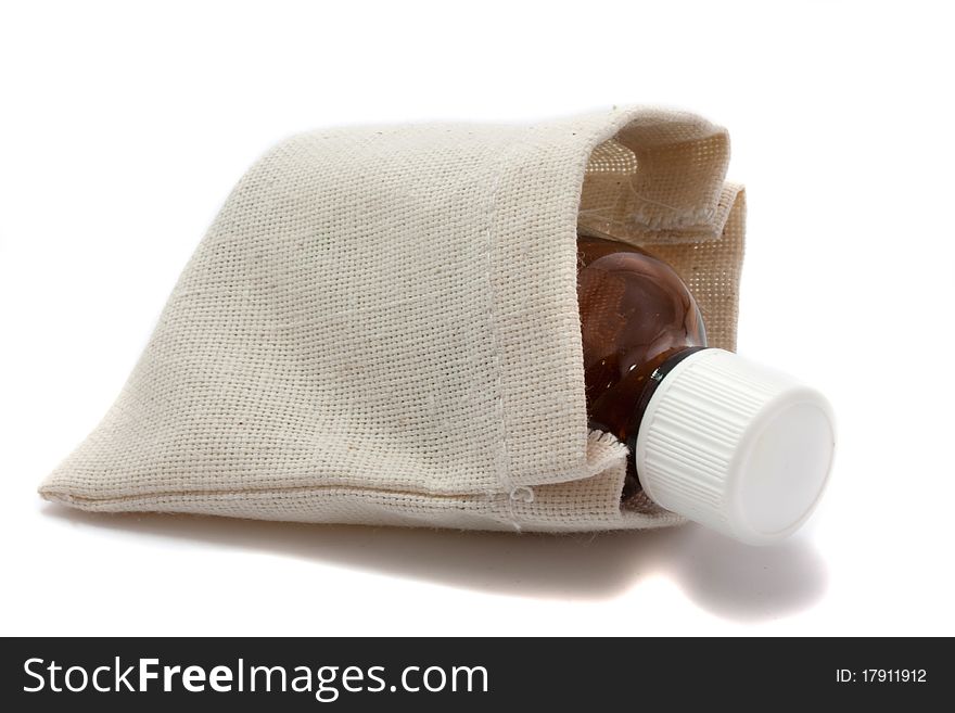 Medicine in the rough gray bag on white background. Medicine in the rough gray bag on white background