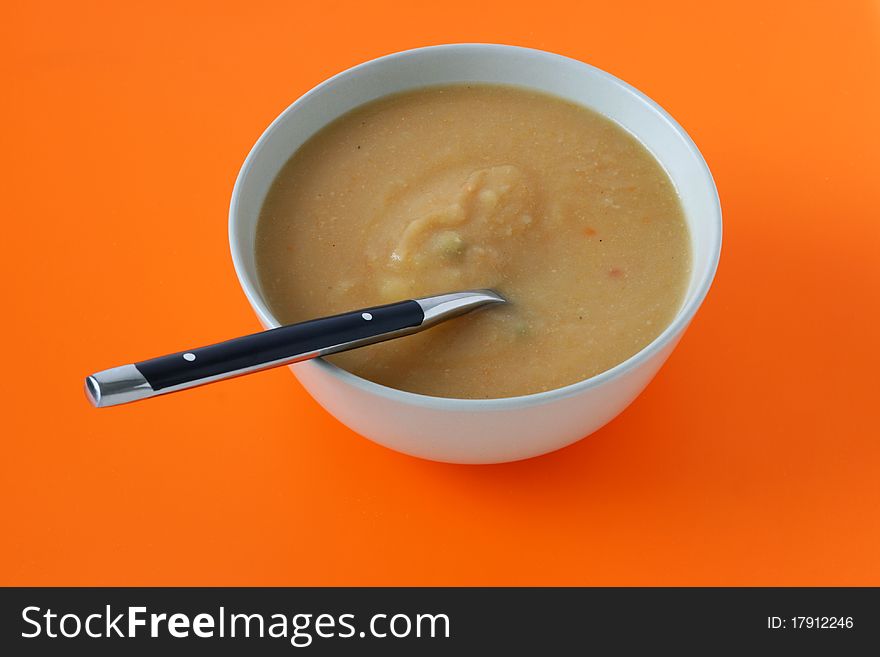 Vegetable soup with spoon