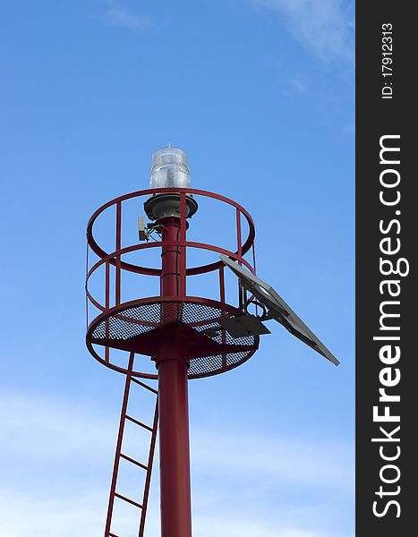 Light house at the entrance of a harbour. Light house at the entrance of a harbour