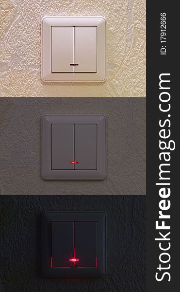Three kinds of light switch over textured wallpaper. Three kinds of light switch over textured wallpaper
