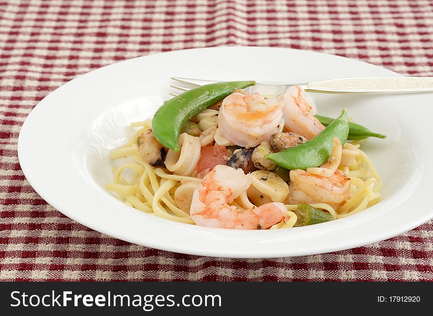 Bowl of seafood and al dente pasta meal. Bowl of seafood and al dente pasta meal