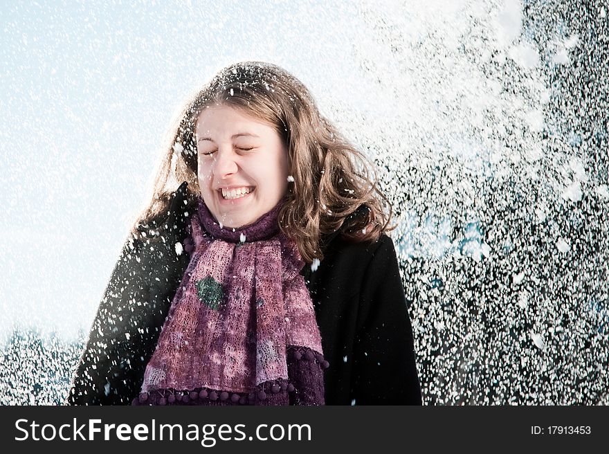 Happy Young Woman In  Snowfall