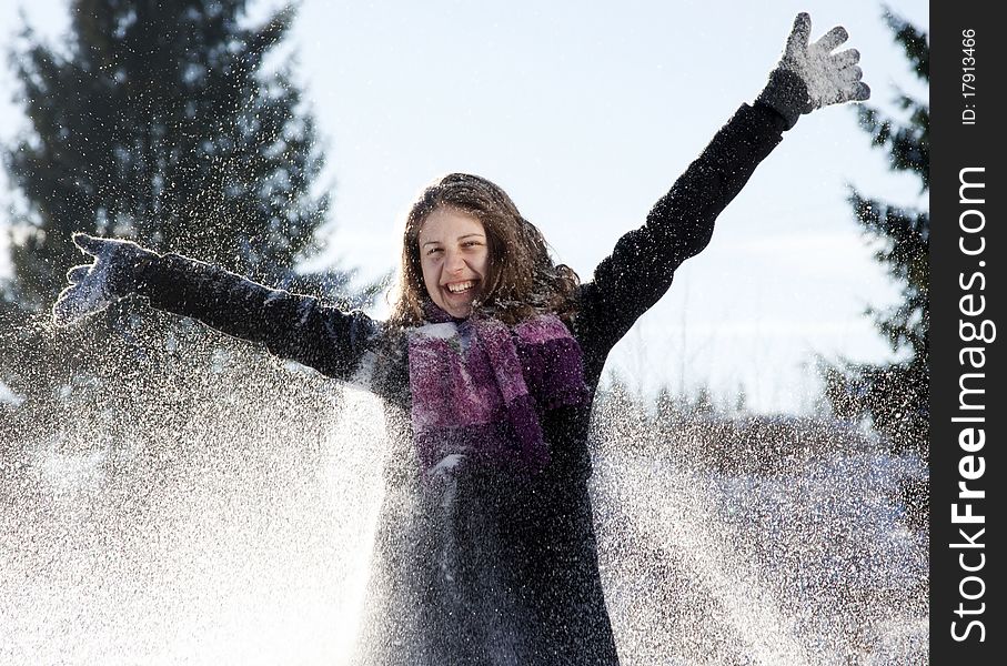 Happy Young Woman In  Snowfall