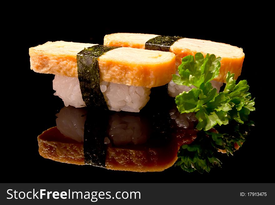 Traditional Japanese food structured over black