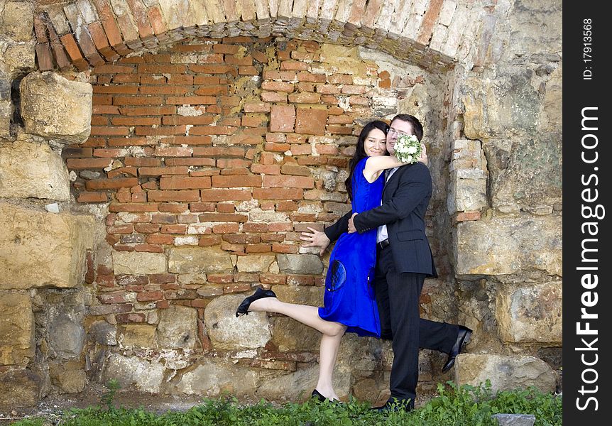 Romantic couple - woman with bouquet