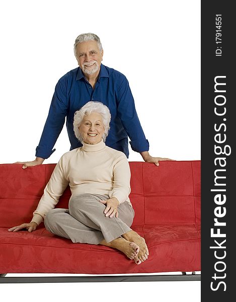Portrait of a happy couple of elderly in a white background