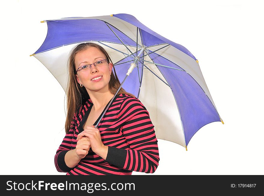 A young girl smiles holding a umbrella from the rain. A young girl smiles holding a umbrella from the rain