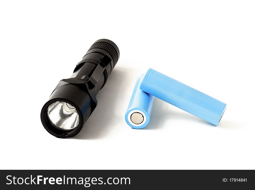 Black LED flashlights and two accumulators. Isolated image. Black LED flashlights and two accumulators. Isolated image.