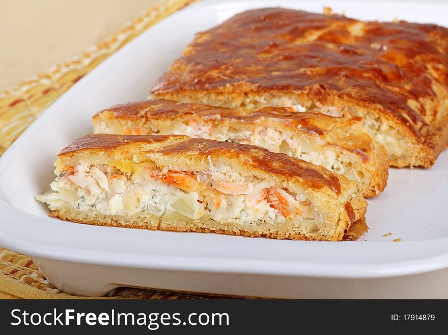 Stuffed crab meat loaf sliced on a platter