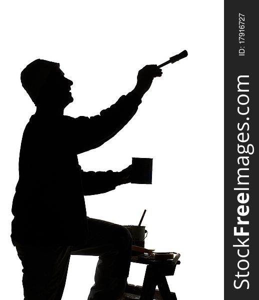 Silhouette of a painter at work