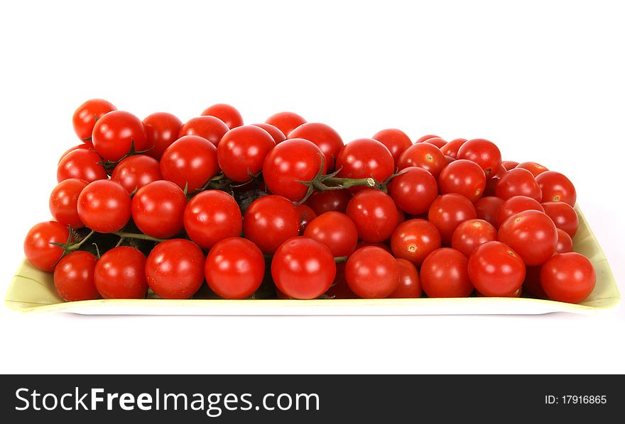 Cherry tomato --is a smaller garden variety of tomato, on a white background