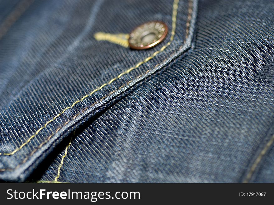 Close-up of blue jeans, backside with pocket