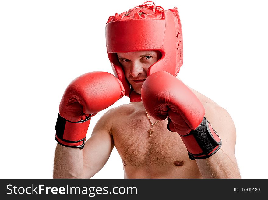 Professional boxer standing in stance with gloves and protective headgear isolated on white background. Professional boxer standing in stance with gloves and protective headgear isolated on white background