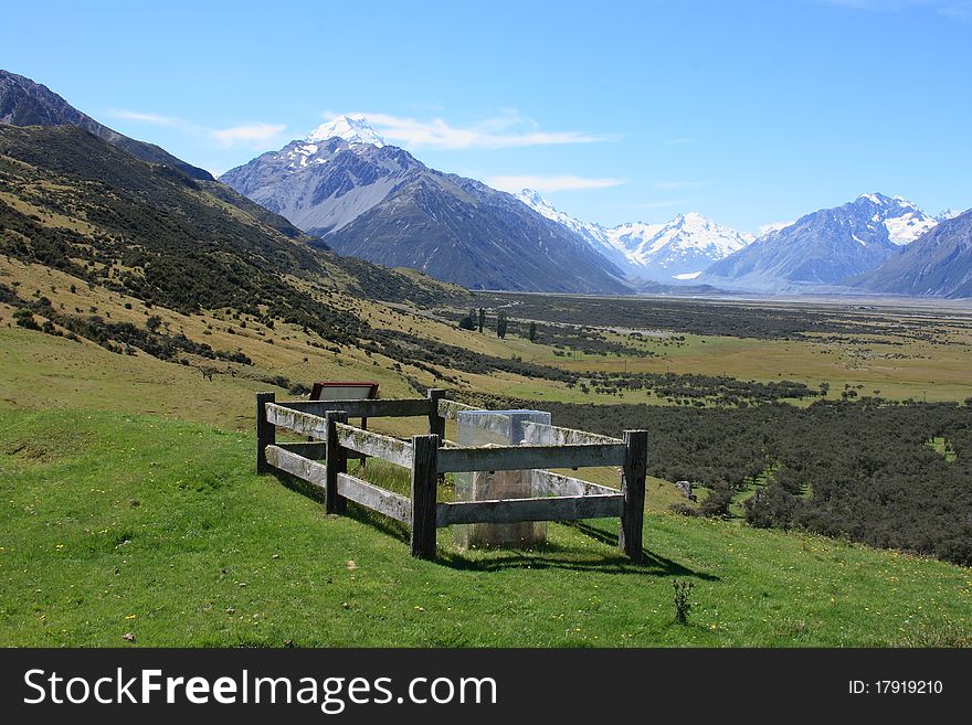 Looking over a single grave towards The icey summit of Mt Cook. Looking over a single grave towards The icey summit of Mt Cook.