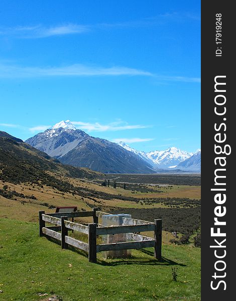 Looking over a single grave towards The icey summit of Mt Cook. Looking over a single grave towards The icey summit of Mt Cook.