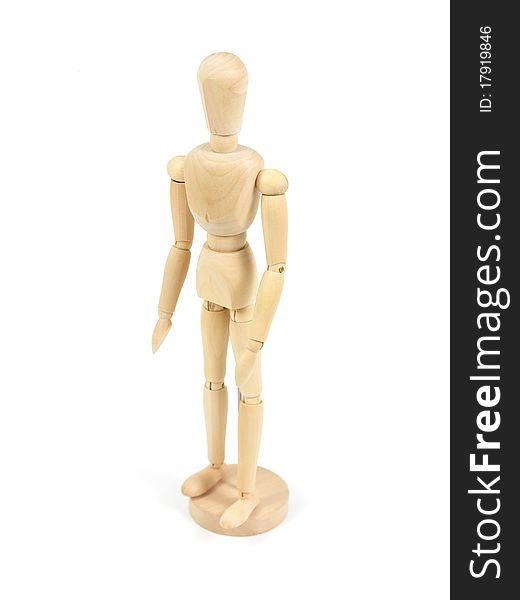 A wooden mannequin isolated against a white background. A wooden mannequin isolated against a white background