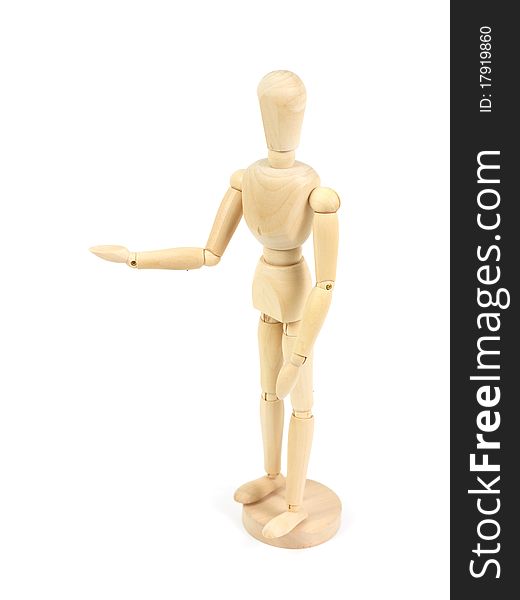 A wooden mannequin isolated against a white background. A wooden mannequin isolated against a white background