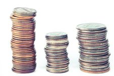 Three Piles Of Coins Stock Image