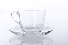 Transparent Glass Cup And Saucer Royalty Free Stock Images
