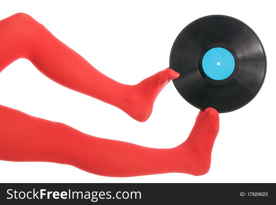 Female feet with vinyl record isolated in white