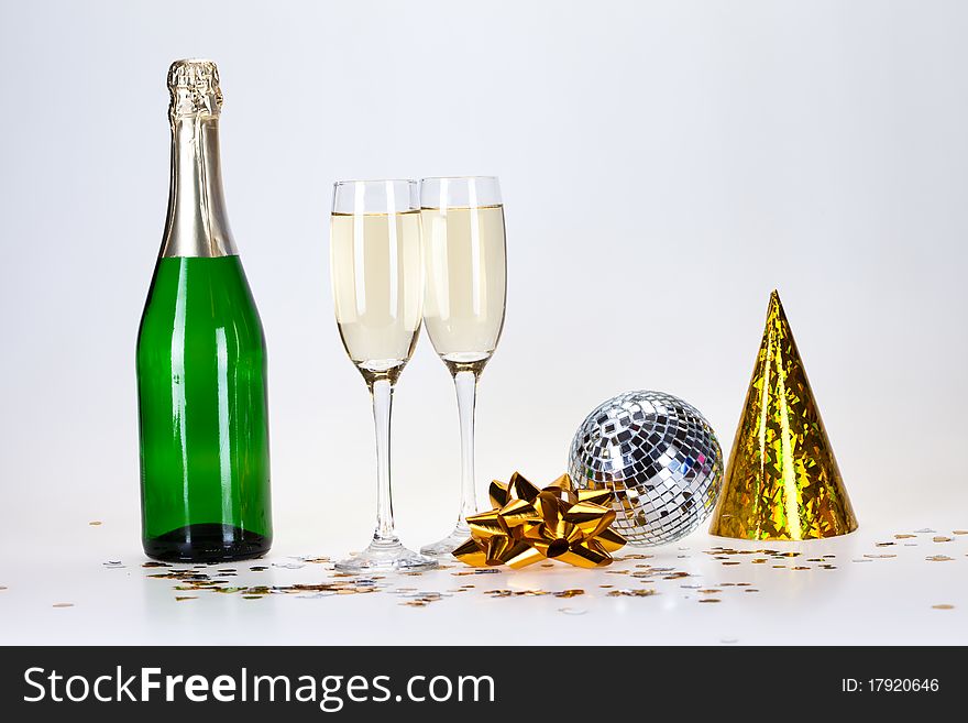 Champagne and glass on the white background. Champagne and glass on the white background.