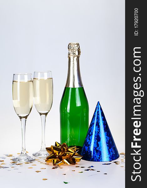 Champagne and glass on the white background. Champagne and glass on the white background.