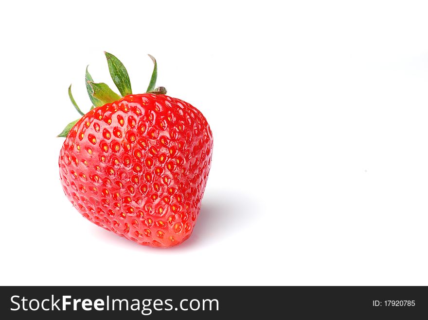 Single fresh red strawberry on white background. Single fresh red strawberry on white background