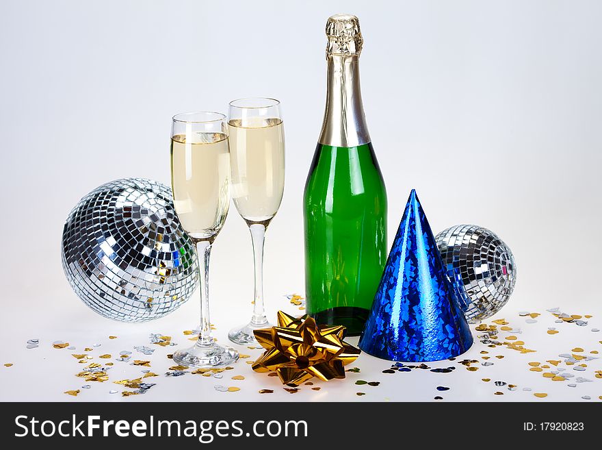 Champagne and glass on the white background. Champagne and glass on the white background.