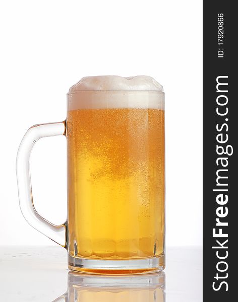 Glass of beer close-up with froth