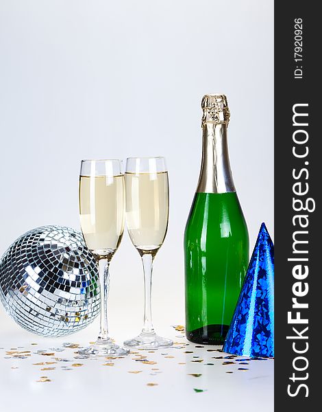 Champagne and glass on the white background. Champagne and glass on the white background.