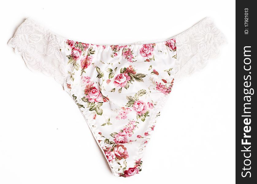 Pink feminine panties with lace on white background. Pink feminine panties with lace on white background