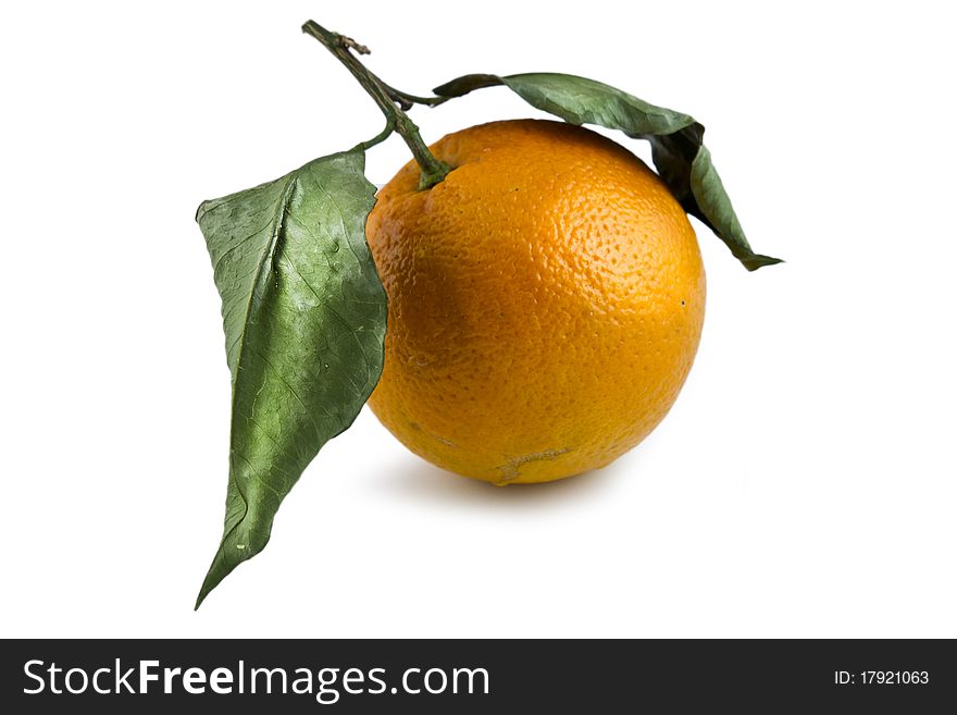 Fresh orange with leafes on white