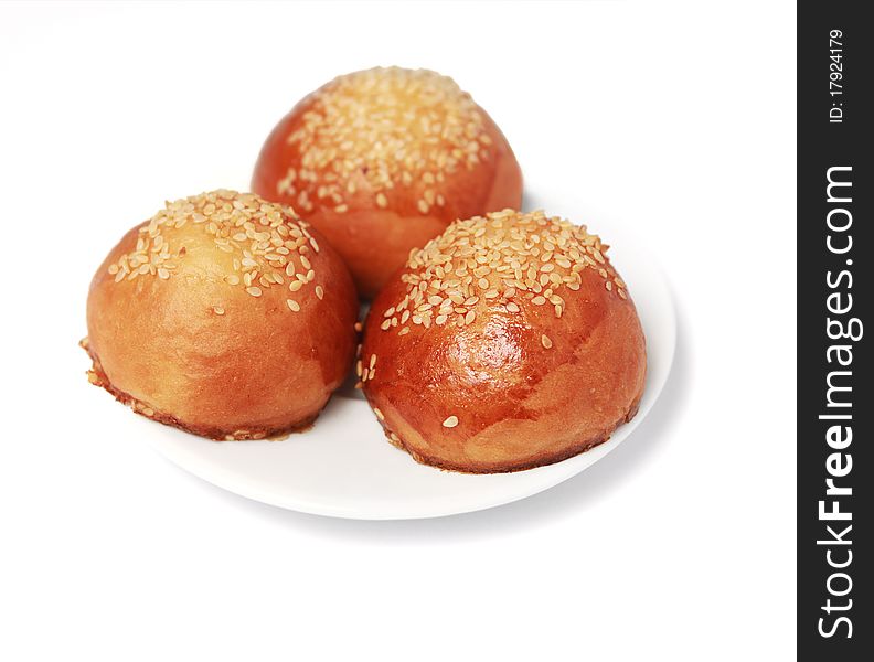 Three just baked loafs on a plate. Three just baked loafs on a plate