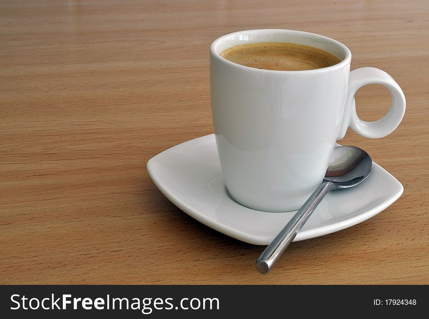 A Drink of Coffee in Cup and Saucer