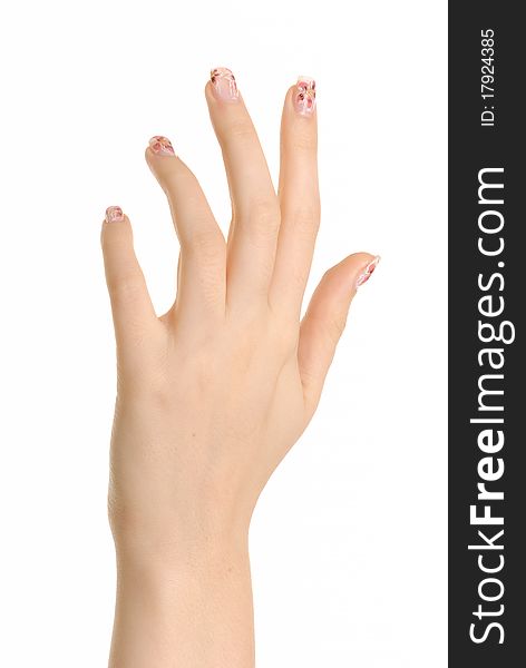 Female hand with a manicure on a white background