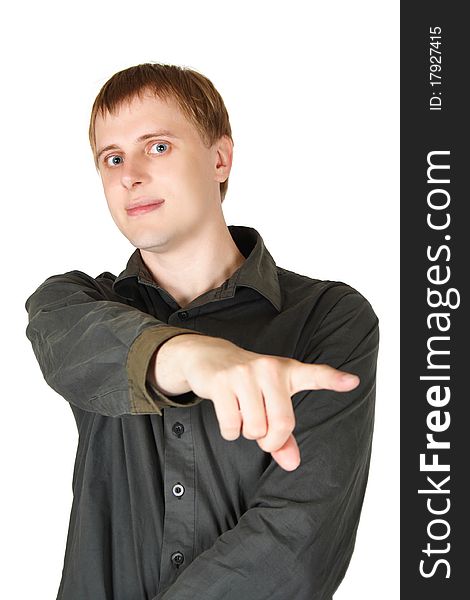 Young handsome man in grey shirt pointing for finger at side, isolated. Young handsome man in grey shirt pointing for finger at side, isolated