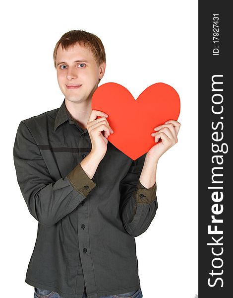 Young caucasian man holding red paper heart, declaration of love, isolated