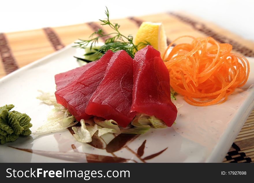 Japanese cuisine is a red tuna fish with vegetables