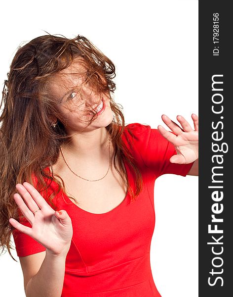 Portrait of a smiling young woman with flying hair. Isolated on white background. Portrait of a smiling young woman with flying hair. Isolated on white background.