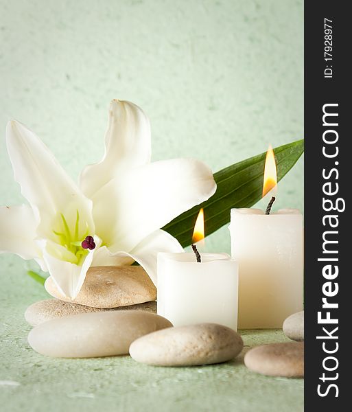 Spa elements with lily and zen stones.