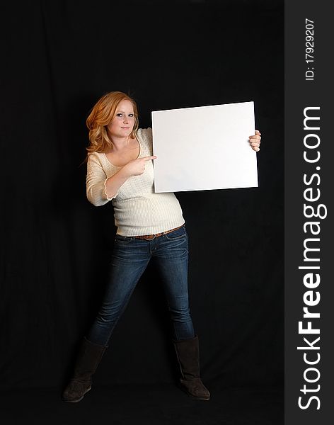 Woman holding blank white placard sign. Woman holding blank white placard sign.